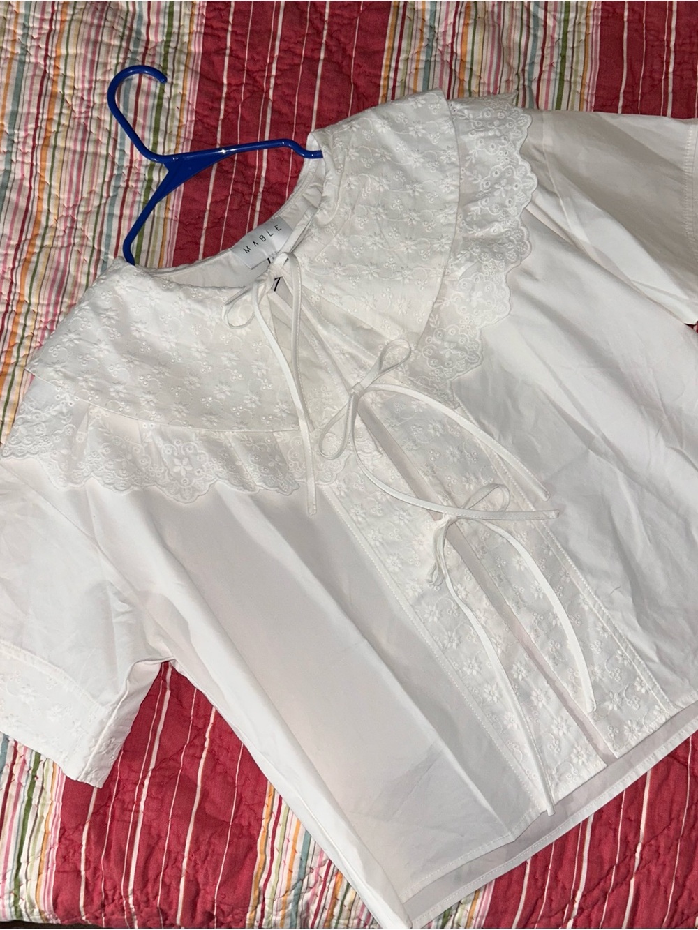 White Embroidered Eyelet Tie-Front Blouse by Mable